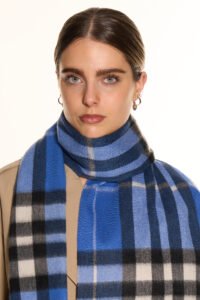 A Blue cashmere scarf in a luxury handcrafted gift box.